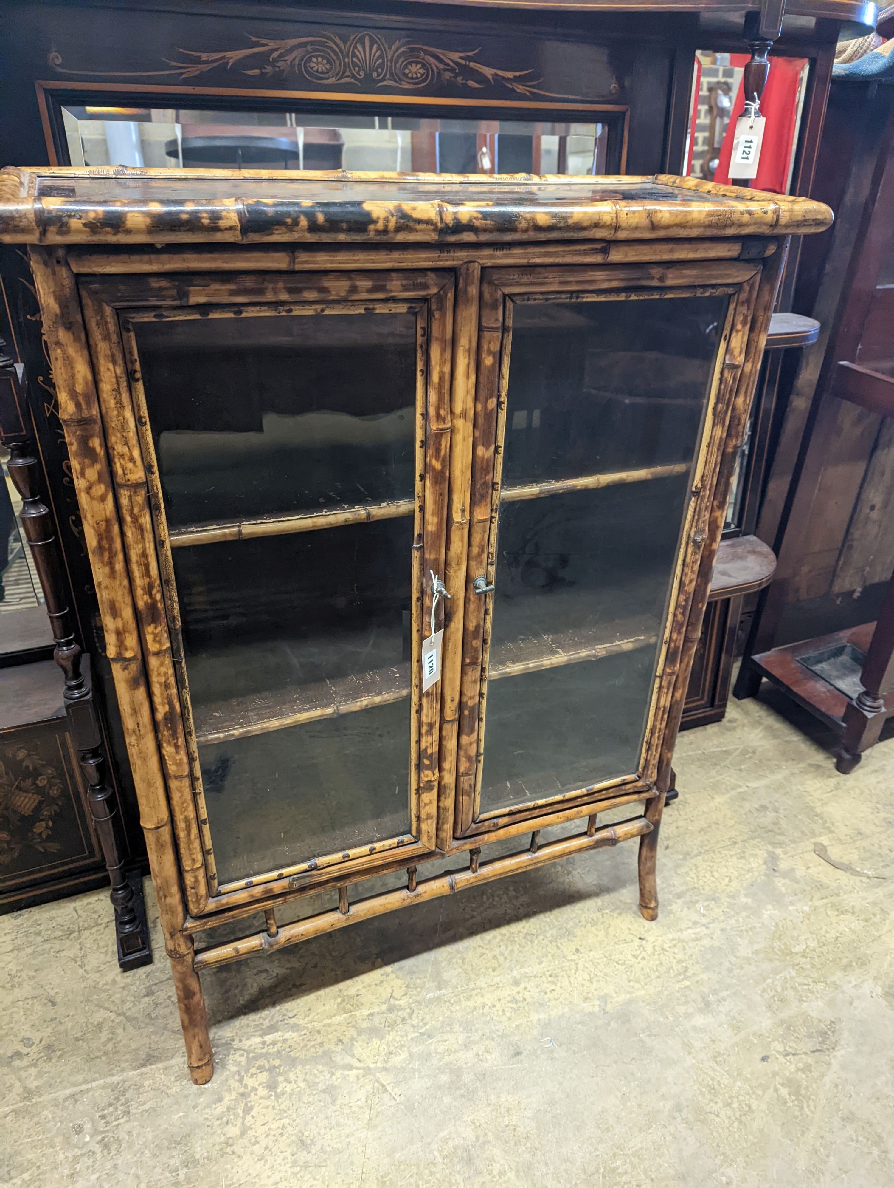 A late Victorian lacquer and bamboo glazed bookcase, length 77cm, depth 31cm, height 105cm